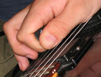 Harmoniques sifflées (pinched harmonics)